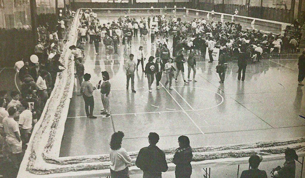 Students make an 1,100-foot-long sandwich in the KFC gym in 1988.