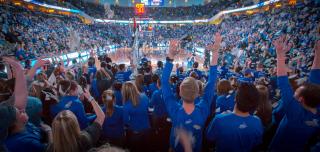 fans and students at Creighton University basketball game showing their spirit