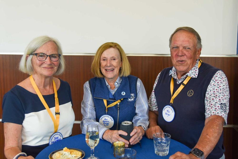 Alumni posing for a photo