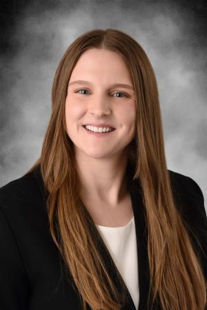 A headshot of a medical student