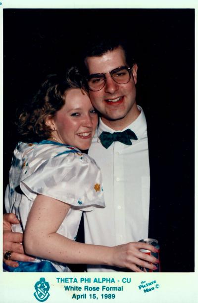 A photo of a couple from a college formal