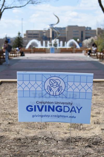 Photo of a Giving Day sign on campus