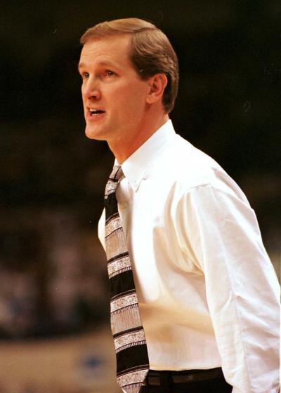 A basketball coach on the sidelines