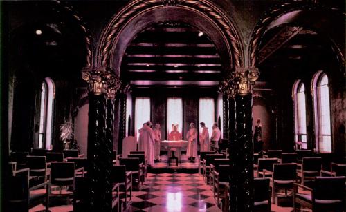 Jesuits praying in a chapel