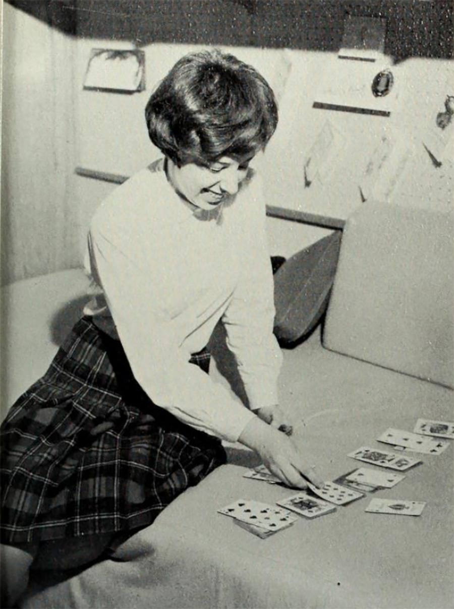 A student plays cards in Gallagher in the 1960s.