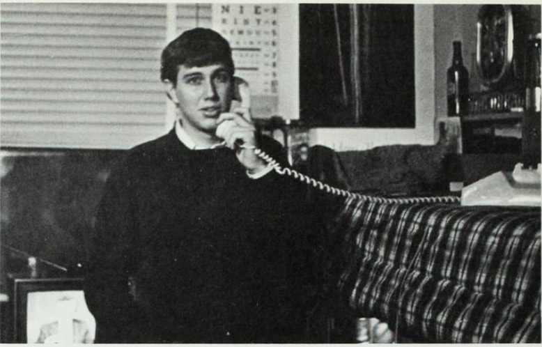 A student talks on the phone in Gallagher Hall.