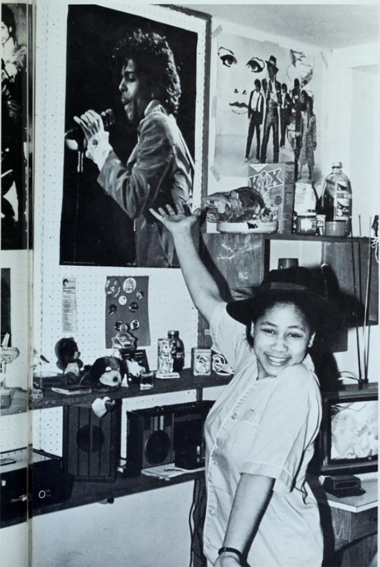 A student shows off her decorations in her Gallagher Hall room.