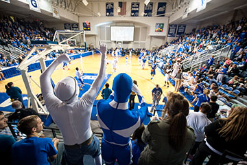 Fans at a women's basketball game