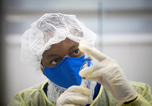 A student works in the pharmacy skills lab.