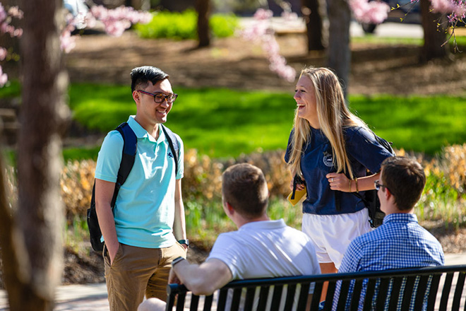 students on Creighton University campus talking