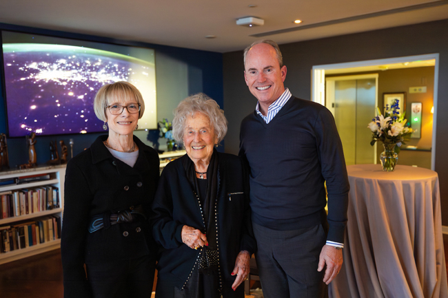 Cindy and Scott Heider, left and right, with Ruth Scott at a gathering celebrating The Bill.