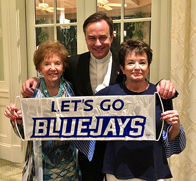 Macaela and Bette with Fr. Hendrickson