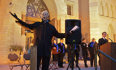 Fr. Schlegel at the tree lighting ceremony.