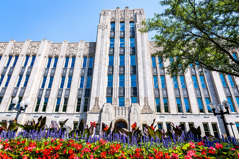 Summer flowers in front of Creighton Hall