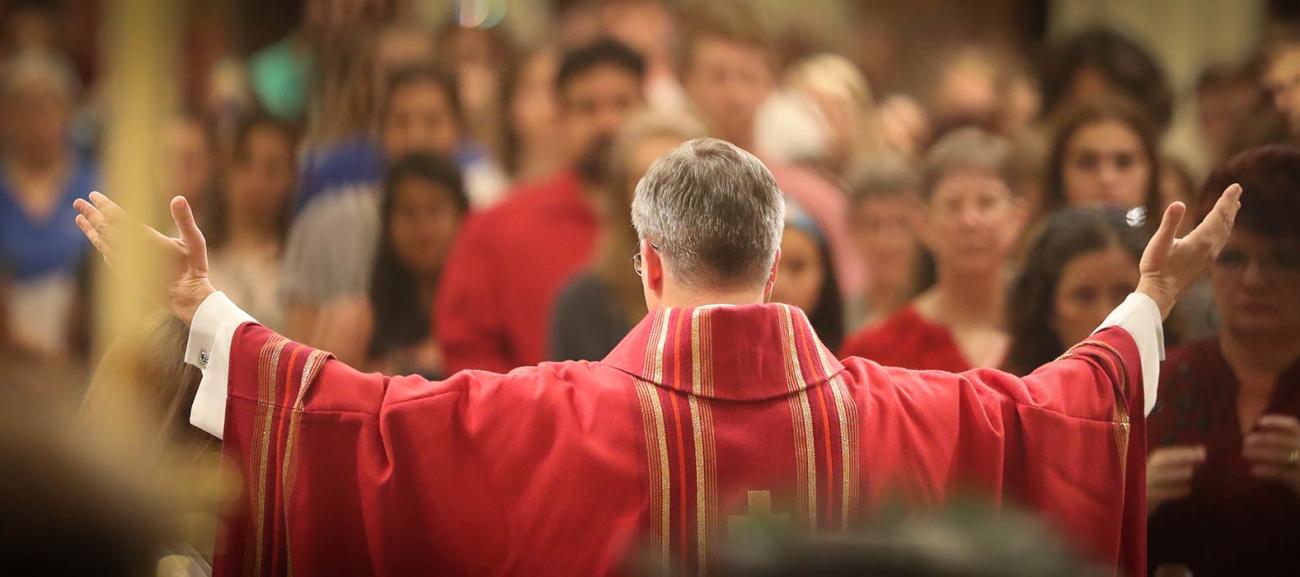 Fr. Hendrickson delivers Mass at church.
