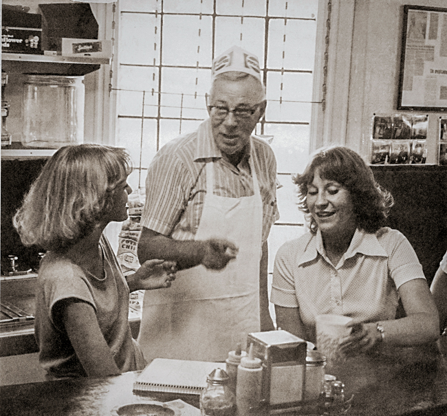 Howard with students Sue Glen and Mary Harre.