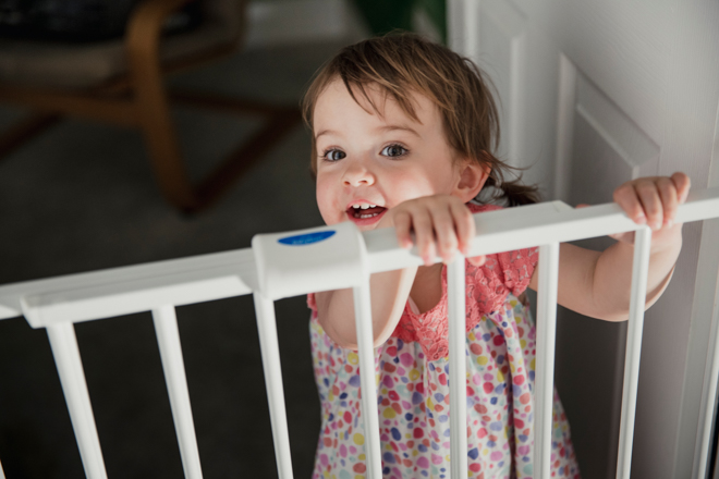 Child at baby gate