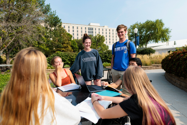 Students talking outside.