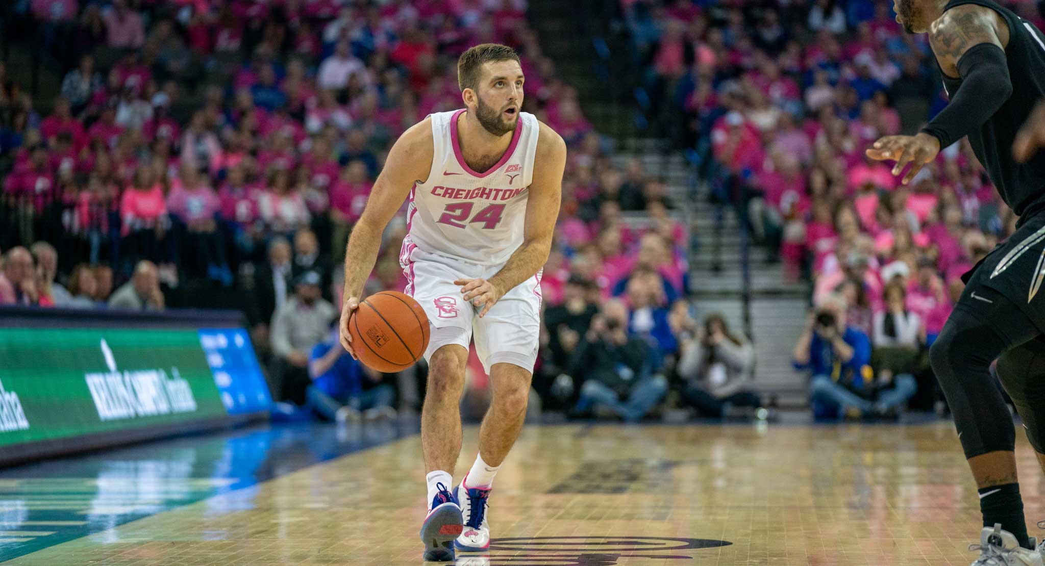 Mitch Ballock dribbles the ball