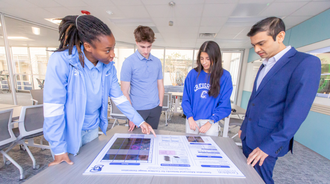 Students meet to discuss AI.