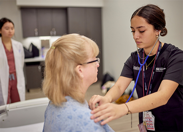 Images of a student listening to a heartbeat at the Summer Health Institute camp.