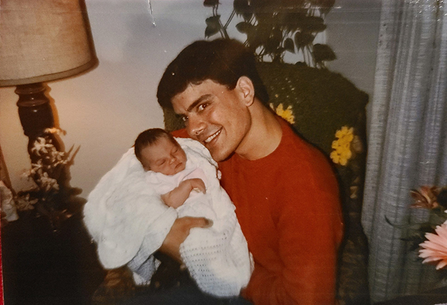 Two Creighton alumni — Jerry Pfeifer, holding his niece Lyndie Pfeifer-Rouse just a few days after her birth April 24, 1986, and before his death May 10, 1986.
