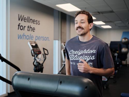 A man runs on a treadmill