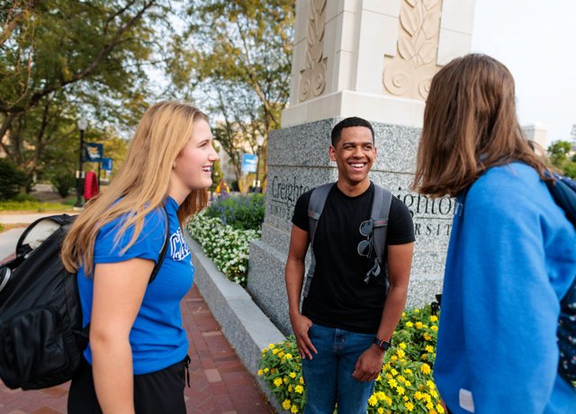 Students talking outside.