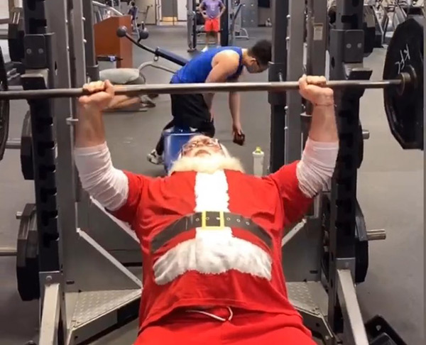 Santa lifting weights