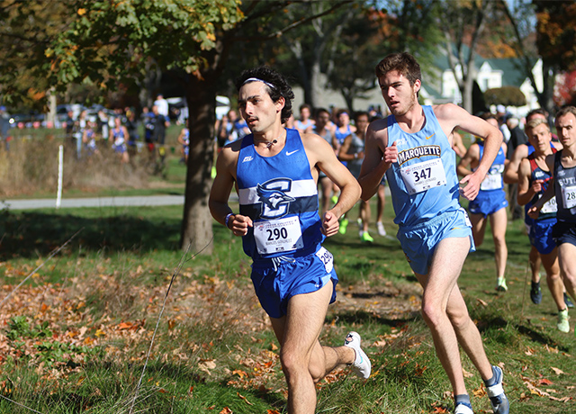 Marcos Gonzalez leads the pack at a cross country meet.