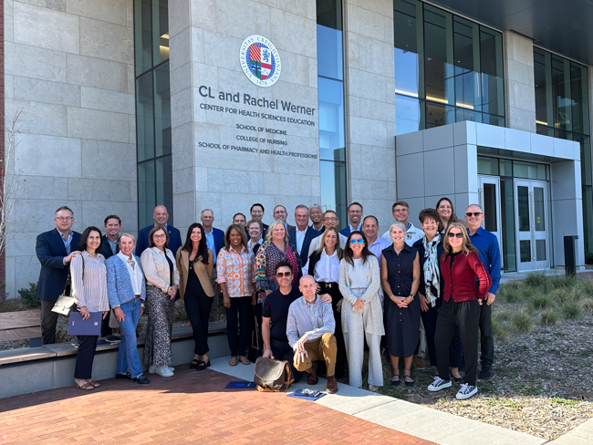 Members of the Council of Regents in front of the CL and Rachel Werner Center for Health Sciences Education