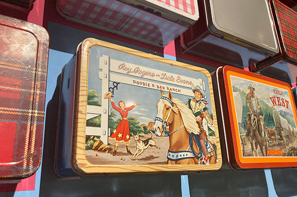 Roy Rogers lunchbox on the wall.