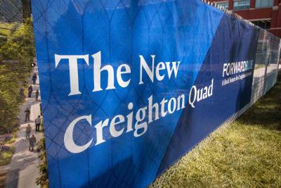 A sign promoting Creighton's new Quad