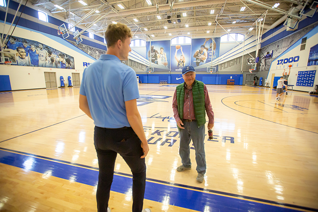 Two "waterboys" decades apart. Brian Hanna gives Doug Ryan a tour of the Championship Center. Photo by Dave Weaver.