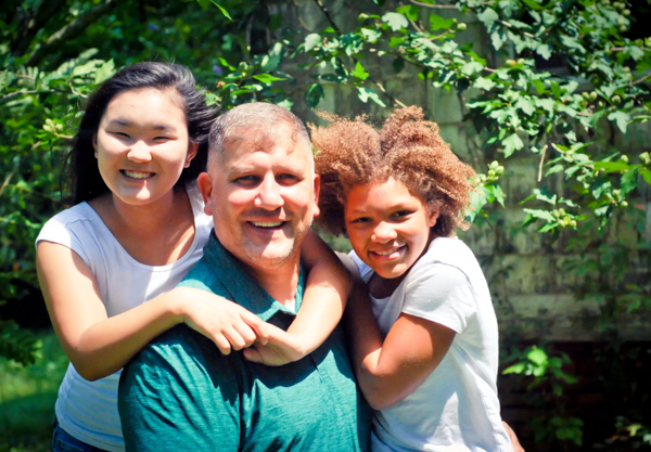 Matthew Badell and his daughters.