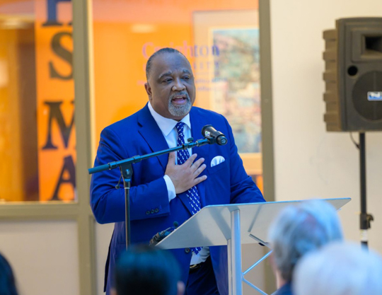 Virgil Miller, president of Aflac U.S., speaks at Creighton on March 18 during a special event.