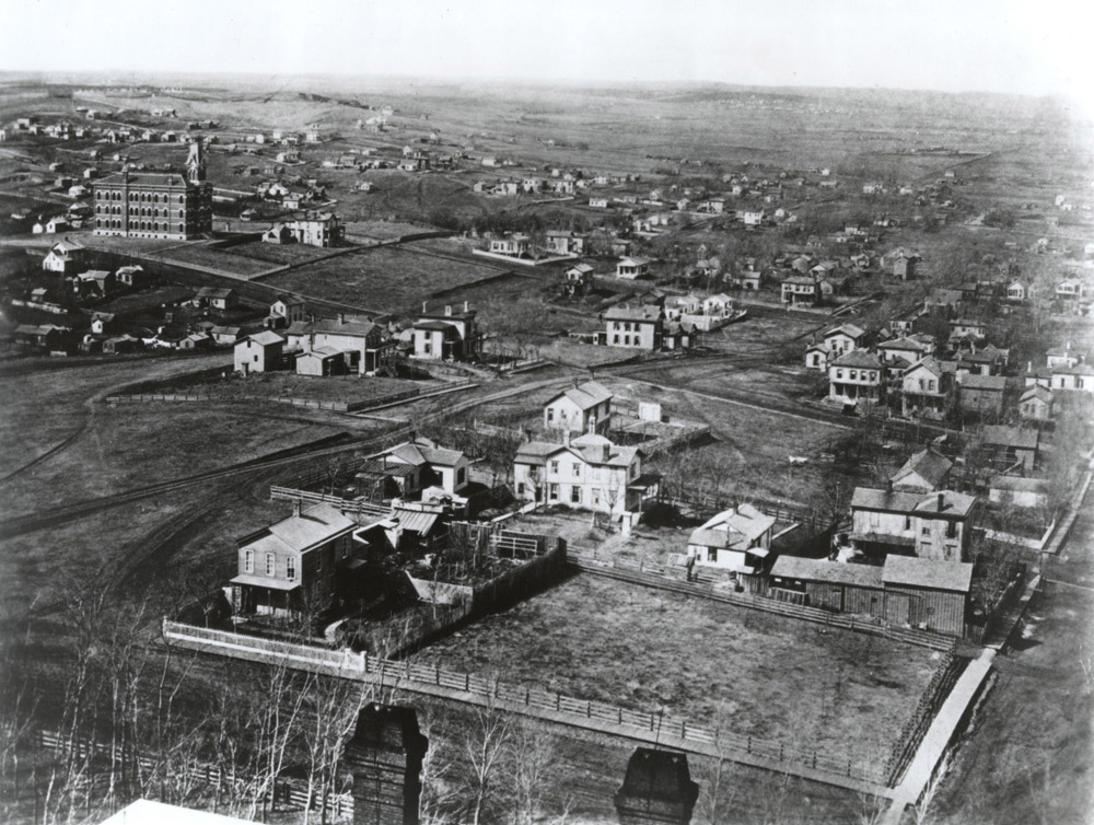 An image of a one-building Creighton College (top left corner) and Omaha in 1878.