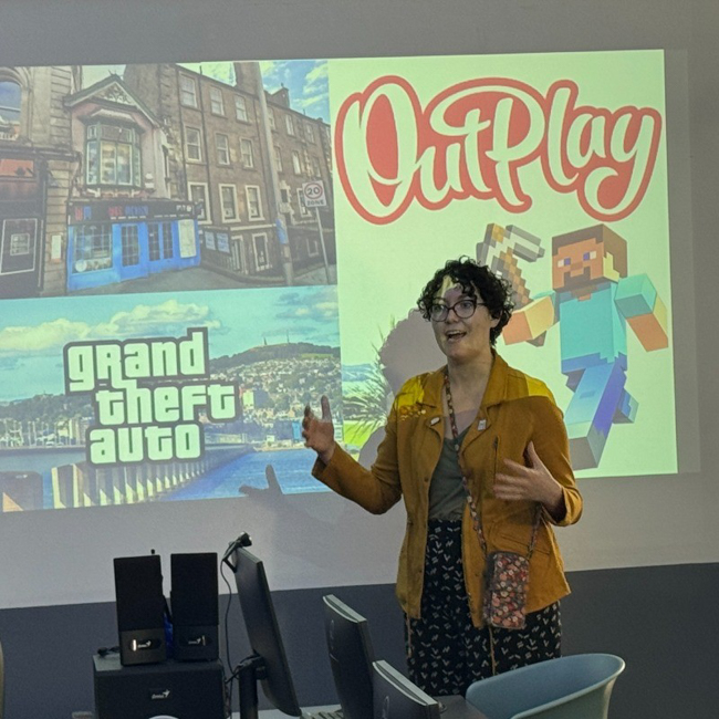 Austin teaches South African students about making games in Dundee.