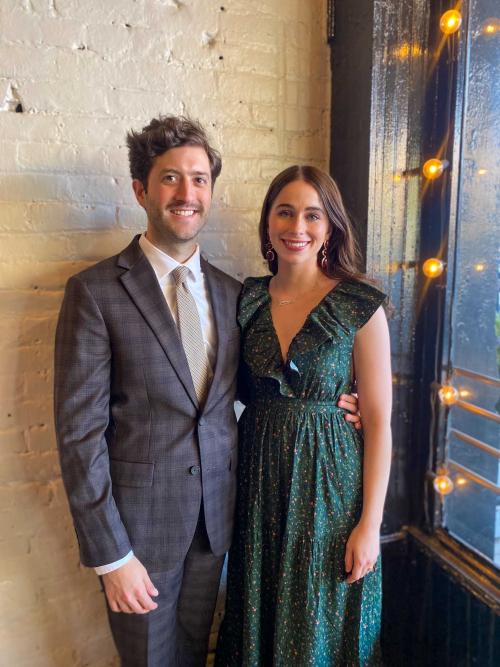 A couple smiles for a photo