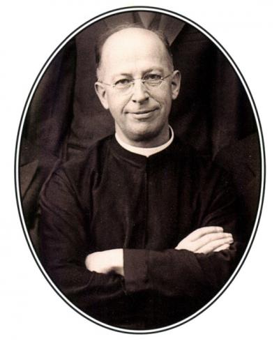 A black and white portrait of a Jesuit