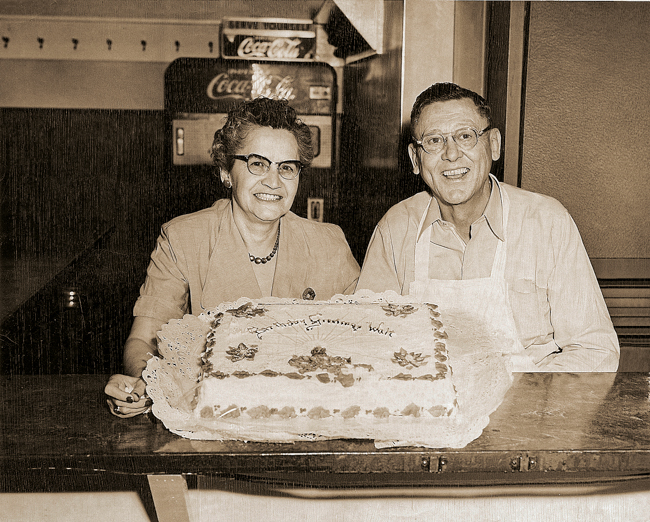 Hazel and Walt Beal celebrating Walt's birthday with free coffee and cake at Beal's, a longtime tradition.