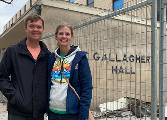 Picture of Kent and Elizabeth Padomek in front of Gallagher.