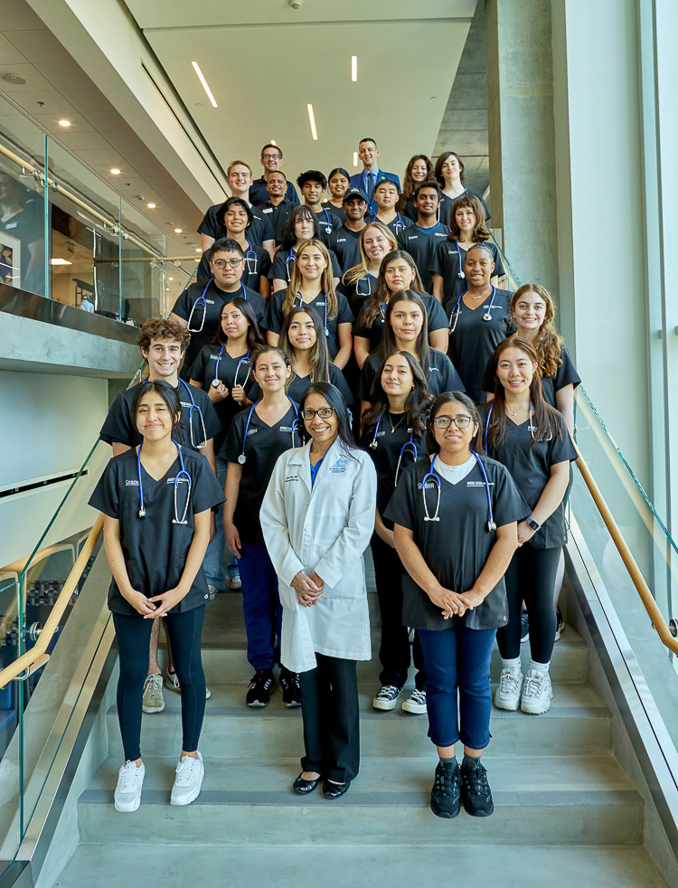 Dr. Jaya Raj, front/center, with a group of this year's Burton Family Foundation Summer Health Institute students at Creighton's Phoenix campus.