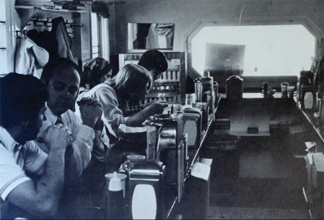 Interior shot of Beal's Grill. Guests at the u-shaped bar. Interior shot of Beal's Grill. Guests at the u-shaped bar.
