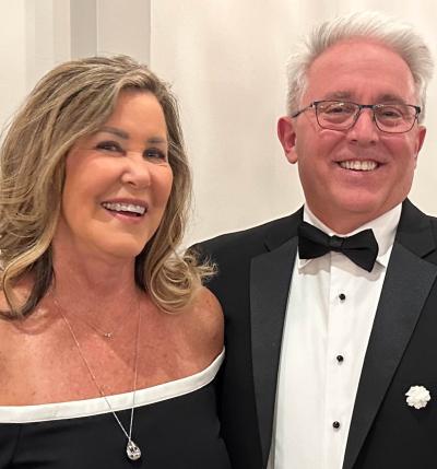 A couple smiles together