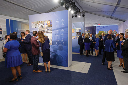 Guests walk through an interactive experience highlighting Creighton's history and future.