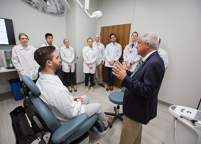 Thomas Dobleman, MD, teaches Creighton dental students how to spot malignancies.