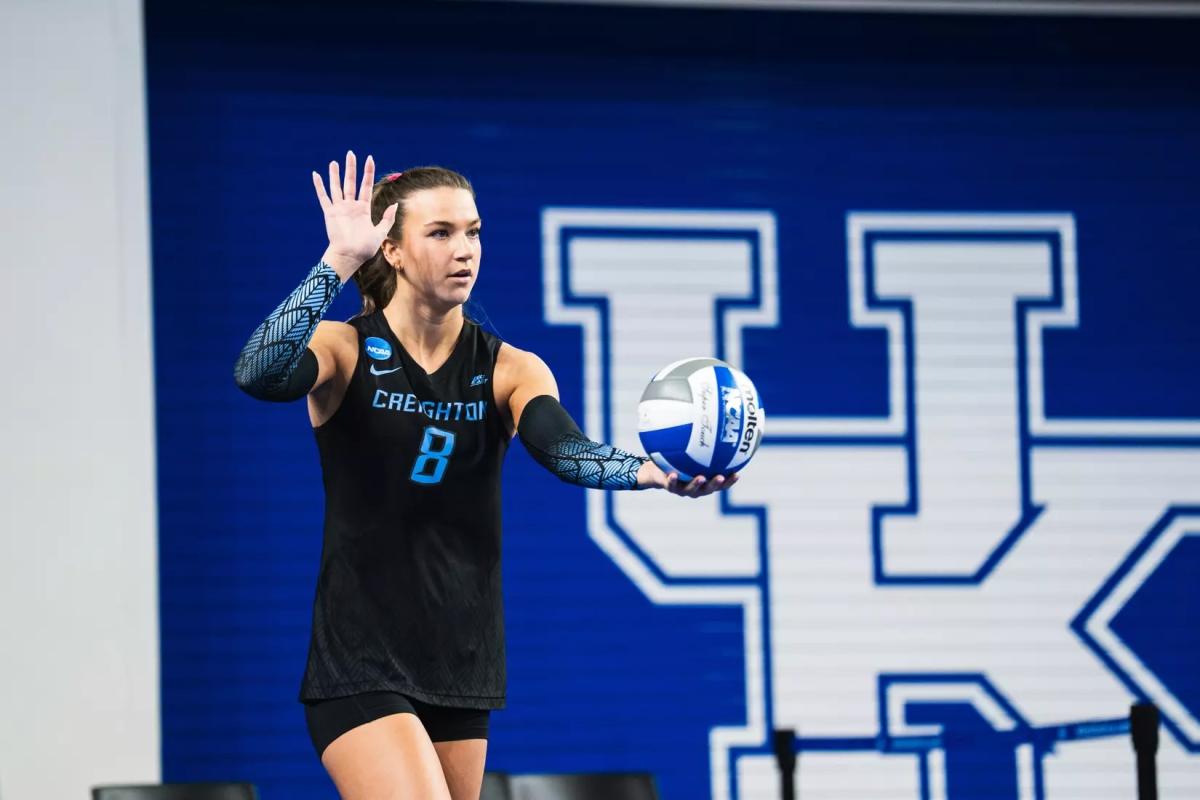 Volleyball player serving