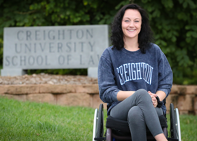 Student Lexi Weisbeck posing in front of Creighton