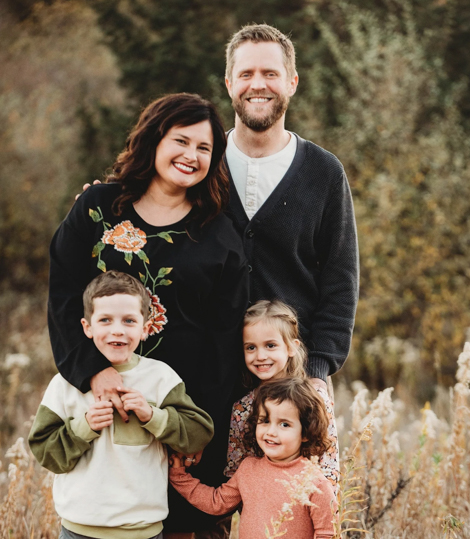 Sedillo and her husband, Tedd Welniak, MD, BS'07, with their three children.